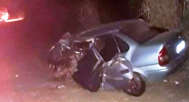 Acidente na BR 040 entre carro de passeio e  bitrem mata pai e dois filhos